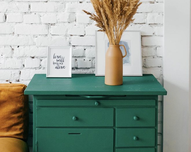 green drawers with white wall